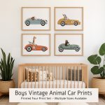 Printed set of four unframed wall art prints featuring animals (giraffe, bear, mole, rabbit) driving vintage race cars in orange, blue, green, and yellow colors. Perfect boys nursery or playroom decor.